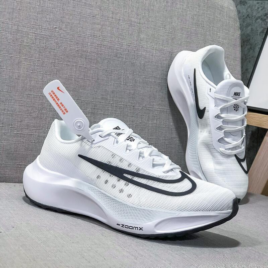 Tennis Dama running NK zoom fly 5 Generación